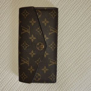 Louis Vuitton Sarah wallet, classic monogram